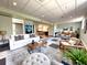 Spacious living room with ample seating, stylish decor, and a view of the kitchen at 942 Batesville Rd, Canton, GA 30115