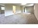 Spacious main bedroom features neutral walls and carpeted floors at 942 Batesville Rd, Canton, GA 30115