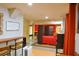 A modern bedroom featuring a privacy screen and partial view of the living room in a studio-style apartment at 7435 Woodruff Way, Stone Mountain, GA 30087