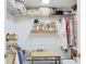 Organized walk-in closet with shelving and hanging space for storage at 7435 Woodruff Way, Stone Mountain, GA 30087