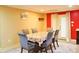 Basement dining room with seating for six and a door leading to the outside at 7435 Woodruff Way, Stone Mountain, GA 30087
