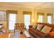 Bright living room area with lots of natural light, hardwood floors, and neutral wall colors at 7435 Woodruff Way, Stone Mountain, GA 30087