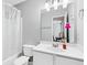 Clean bathroom with a shower, tub combination, and a white vanity at 805 Abbotts Mill Ct # 74, Duluth, GA 30097