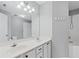 Bathroom featuring dual sinks and a large mirror above the vanity at 805 Abbotts Mill Ct # 74, Duluth, GA 30097