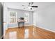 Bedroom with hardwood floors and natural light at 805 Abbotts Mill Ct # 74, Duluth, GA 30097