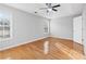 Bright bedroom with hardwood floors and large windows at 805 Abbotts Mill Ct # 74, Duluth, GA 30097