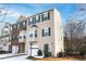 Attractive townhome with neutral siding, green shutters, and an attached one car garage at 805 Abbotts Mill Ct # 74, Duluth, GA 30097