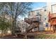 Back exterior of home with stairs, decks, and attached balconies at 805 Abbotts Mill Ct # 74, Duluth, GA 30097
