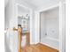 Hallway with hardwood floors and a large closet at 805 Abbotts Mill Ct # 74, Duluth, GA 30097
