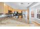 Bright kitchen with stainless steel appliances and granite countertops at 805 Abbotts Mill Ct # 74, Duluth, GA 30097