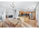 Open kitchen with an island, stainless steel appliances, and an adjacent dining area at 805 Abbotts Mill Ct # 74, Duluth, GA 30097