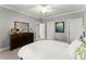 Bright bedroom with modern gray walls, white trim, and a stylish dresser at 1104 Victoria Ne St, Brookhaven, GA 30319