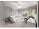 Charming bedroom featuring a daybed, accent chair, and soft, natural light at 1104 Victoria Ne St, Brookhaven, GA 30319