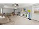 Bright living room featuring stylish furniture, shelving, and lots of natural light at 1104 Victoria Ne St, Brookhaven, GA 30319
