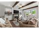 Comfortable living room with a fireplace, built-in shelves, and cozy seating arrangement at 1104 Victoria Ne St, Brookhaven, GA 30319