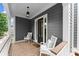 Cozy porch with rocking chairs, showcasing classic design and peaceful outdoor seating at 1104 Victoria Ne St, Brookhaven, GA 30319