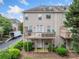 The back exterior of the home features a deck and outdoor space perfect for relaxing at 6054 China Rose Ln, Duluth, GA 30097