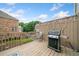 Outdoor deck featuring a grill, wooden railing and view of the neighborhood at 6054 China Rose Ln, Duluth, GA 30097