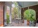 Relaxing covered porch with seating, perfect for enjoying the outdoors at 655 E Pelham Ne Rd, Atlanta, GA 30324