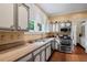Kitchen featuring stainless steel appliances and lots of counter space at 655 E Pelham Ne Rd, Atlanta, GA 30324