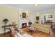 Inviting living room with fireplace and hardwood floors; great natural light at 655 E Pelham Ne Rd, Atlanta, GA 30324