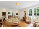 Bright living room with hardwood floors, arched doorway and lots of light at 655 E Pelham Ne Rd, Atlanta, GA 30324