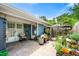 Well-maintained backyard patio, complemented by manicured landscaping and mature trees at 1141 Moorestown Cir, Decatur, GA 30033