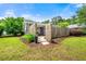 Spacious backyard featuring lush green lawn and a charming patio area, perfect for outdoor entertaining at 1141 Moorestown Cir, Decatur, GA 30033