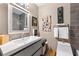 Modern bathroom featuring a floating vanity with a sleek countertop and stylish decor at 1141 Moorestown Cir, Decatur, GA 30033