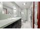 Modern bathroom showcasing a sleek vanity, stylish lighting, and a glass-enclosed shower at 1141 Moorestown Cir, Decatur, GA 30033