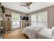 Bright bedroom with hardwood floors, a ceiling fan, and plenty of natural light at 1141 Moorestown Cir, Decatur, GA 30033