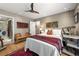 Bedroom with a ceiling fan, hardwood floors, and access to the deck or patio at 1141 Moorestown Cir, Decatur, GA 30033