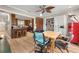 Open concept dining room with hardwood floors and seamless access to the modern kitchen at 1141 Moorestown Cir, Decatur, GA 30033
