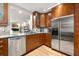 Modern kitchen with stainless steel appliances, wood cabinets, and an open design at 1141 Moorestown Cir, Decatur, GA 30033