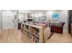 Bright living room with hardwood floors, a cozy fireplace, and stylish decor at 1141 Moorestown Cir, Decatur, GA 30033