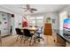 Bright home office with hardwood floors, large window, and a unique ceiling fan at 1141 Moorestown Cir, Decatur, GA 30033