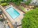 Inviting in-ground pool with lounge chairs, landscaping, and nearby seating areas at 1141 Moorestown Cir, Decatur, GA 30033