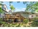 Spacious backyard features a wooden deck and beautiful green space at 1231 Mansfield Ne Ave, Atlanta, GA 30307
