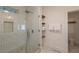 Modern bathroom featuring a glass-enclosed shower with stylish tile work and designer fixtures at 1231 Mansfield Ne Ave, Atlanta, GA 30307