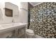 Modern bathroom with tiled shower, stylish vanity, and contemporary fixtures at 1231 Mansfield Ne Ave, Atlanta, GA 30307