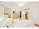 Inviting bedroom with a bed, hardwood floors, and plenty of natural light at 1231 Mansfield Ne Ave, Atlanta, GA 30307