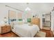 Inviting bedroom with a bed, hardwood floors, and plenty of natural light at 1231 Mansfield Ne Ave, Atlanta, GA 30307