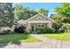 Charming bungalow with mature landscaping, inviting front porch and traditional architectural details at 1231 Mansfield Ne Ave, Atlanta, GA 30307
