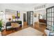 Stylish home office with a modern desk, hardwood floors, and French doors at 1231 Mansfield Ne Ave, Atlanta, GA 30307