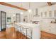 Bright kitchen featuring a large island with seating and stainless steel appliances at 1231 Mansfield Ne Ave, Atlanta, GA 30307