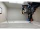 This walk-in closet features a minimalist design, with shelving and storage to efficiently organize your wardrobe at 116 Madeline Ct, Mcdonough, GA 30253