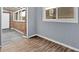 Sunroom with vinyl floor and wood siding at 122 Rue Fontaine, Lithonia, GA 30038