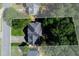 Aerial view of property lines showing proximity of the home to surrounding trees and street at 2015 Towne Lake W Hls, Woodstock, GA 30189