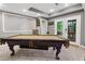 Entertaining basement features a pool table, neutral colors, and an open floor plan at 2015 Towne Lake W Hls, Woodstock, GA 30189
