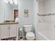 Relaxing bathroom features a bathtub, bright colors, and an integrated vanity at 2015 Towne Lake W Hls, Woodstock, GA 30189